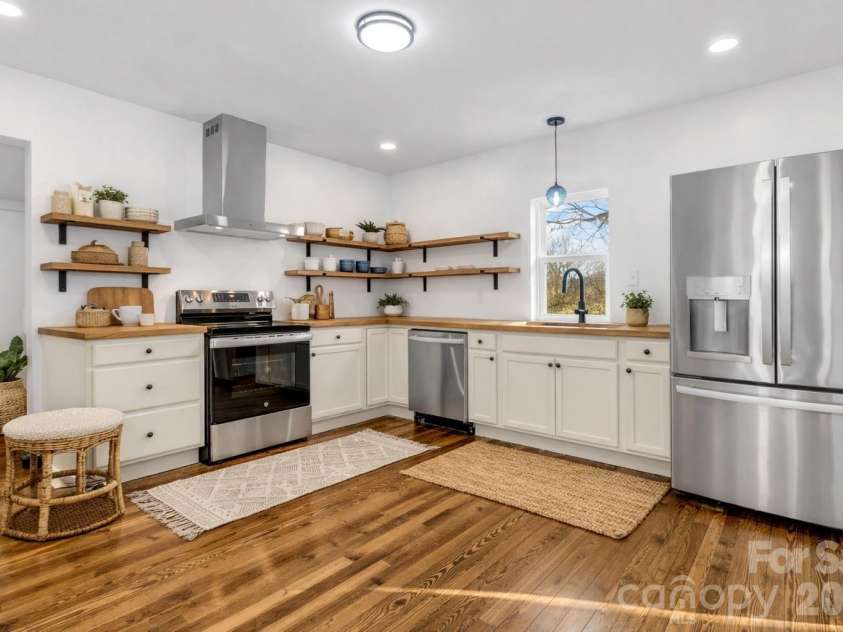 246 Marion Street, Marion, NC 28752.  MLS# CAR4341542, YatesRealty ID 13259. Large open kitchen all new, virtually staged.