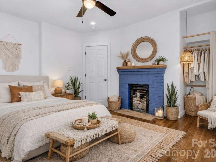 246 Marion Street, Marion, NC 28752.  MLS# CAR4341542, YatesRealty ID 13259. Virtually staged front bedroom. Original fireplace does not work