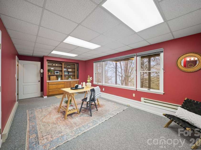 5 Governors Drive, Hendersonville, NC 28791.  MLS# CAR4349901, YatesRealty ID 13265. Lower Level Flex Space