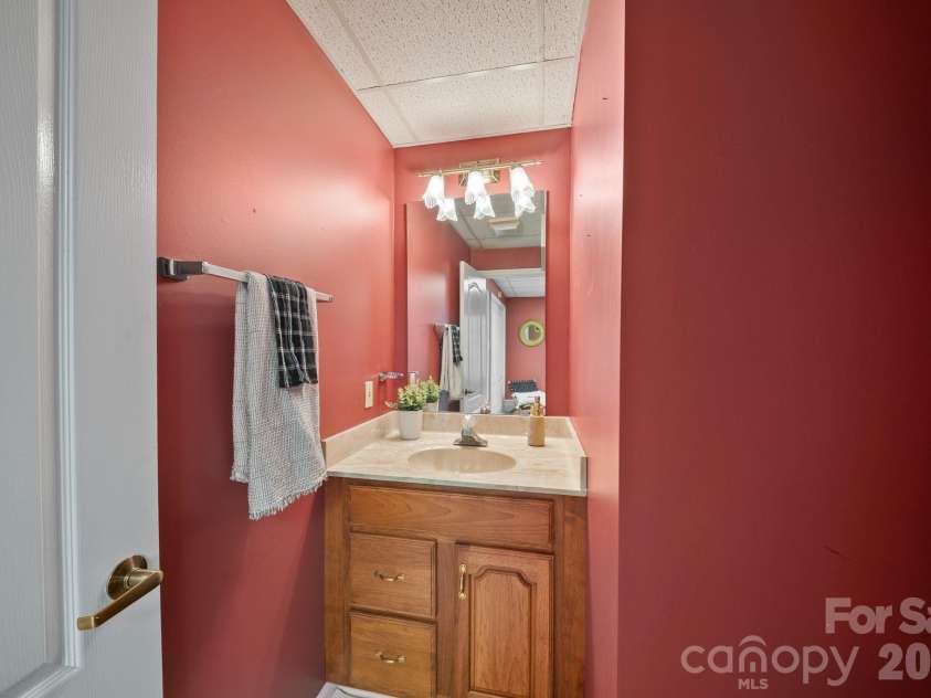 5 Governors Drive, Hendersonville, NC 28791.  MLS# CAR4349901, YatesRealty ID 13265. Lower Level Half Bath