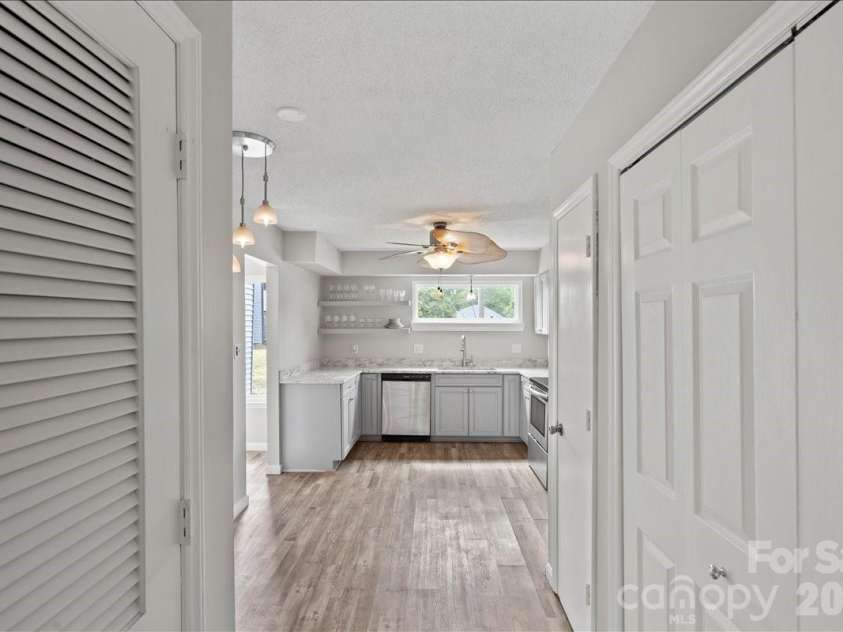 6610 Point Comfort Lane, Charlotte, NC 28226.  MLS# CAR4359736, YatesRealty ID 13266. Kitchen/Laundry Closet