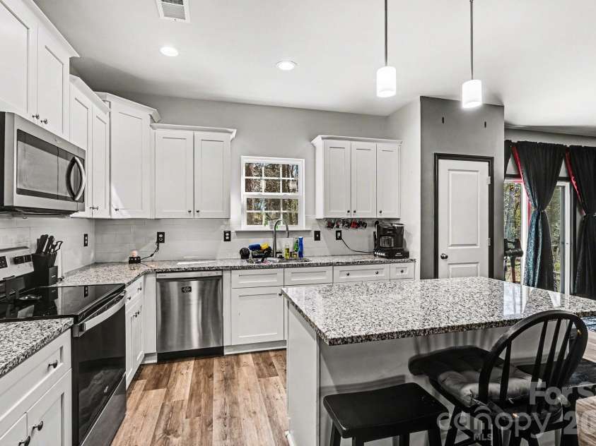 313 Bell Street, Mount Holly, NC 28120.  MLS# CAR4340859, YatesRealty ID 13268. 