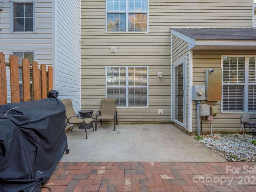 4507 Antelope Lane, Charlotte, NC 28269.  MLS# CAR4225453, YatesRealty ID 13277. Back patio