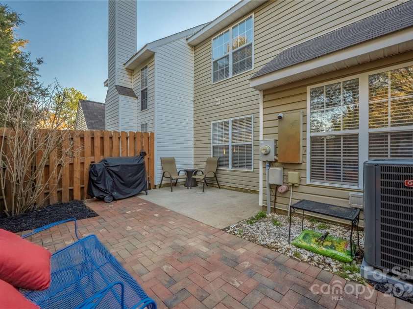 4507 Antelope Lane, Charlotte, NC 28269.  MLS# CAR4225453, YatesRealty ID 13277. Back patio