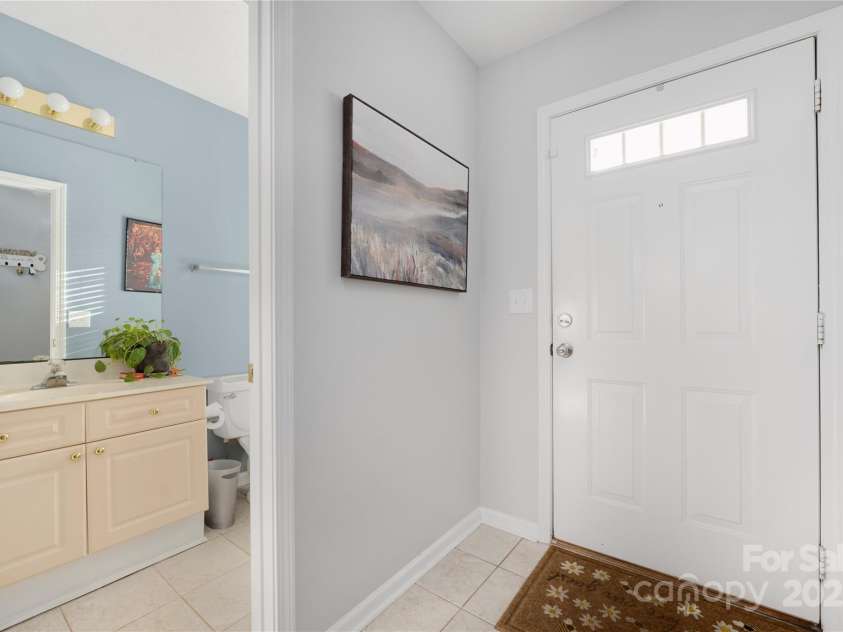 4507 Antelope Lane, Charlotte, NC 28269.  MLS# CAR4225453, YatesRealty ID 13277. Entry and Powder room downstairs