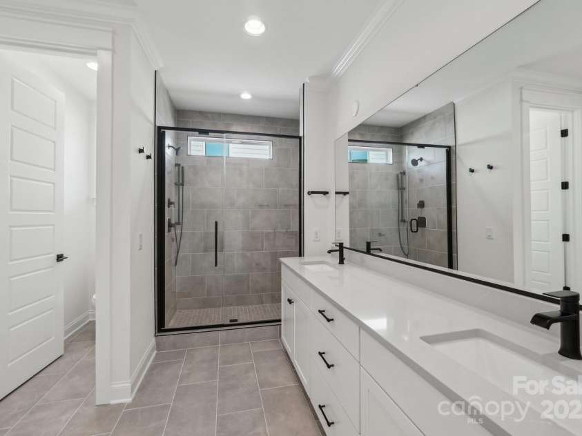 15008 Brownleigh Lane, Huntersville, NC 28078.  MLS# CAR4199680, YatesRealty ID 13280. Primary bath