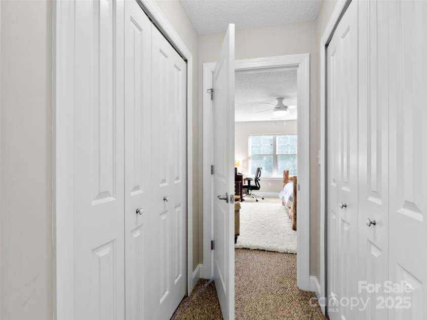 252 Wash Creek Drive, Hendersonville, NC 28739.  MLS# CAR4213185, YatesRealty ID 13281. Double Closet walk through to Primary Bath