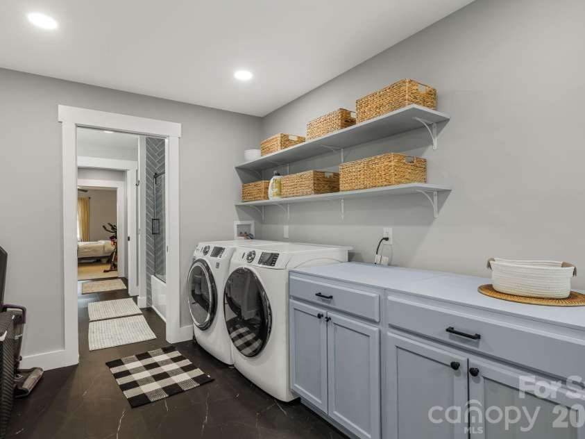 1590 Bruce Road, Mars Hill, NC 28754.  MLS# CAR4340824, YatesRealty ID 13285. Laundry room off the mud room.