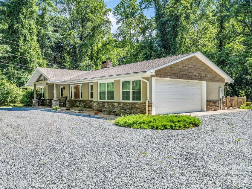 260 Warrior Drive, Tryon, NC 28782.  MLS# CAR4359501, YatesRealty ID 13291. 2 Car garage with storage room
