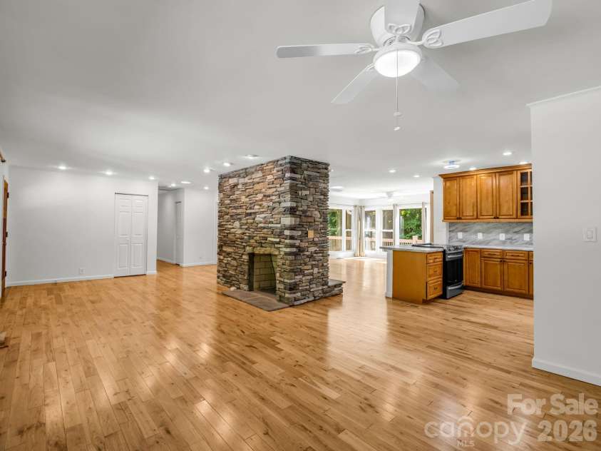 260 Warrior Drive, Tryon, NC 28782.  MLS# CAR4359501, YatesRealty ID 13291. Beautiful massive DUAL fireplace! Open Floorplan with your centerpiece! (*Fireplace was never used, need to have checked out during DD to verify. This was for the picture only. They had an electric stove on this side. The ot
