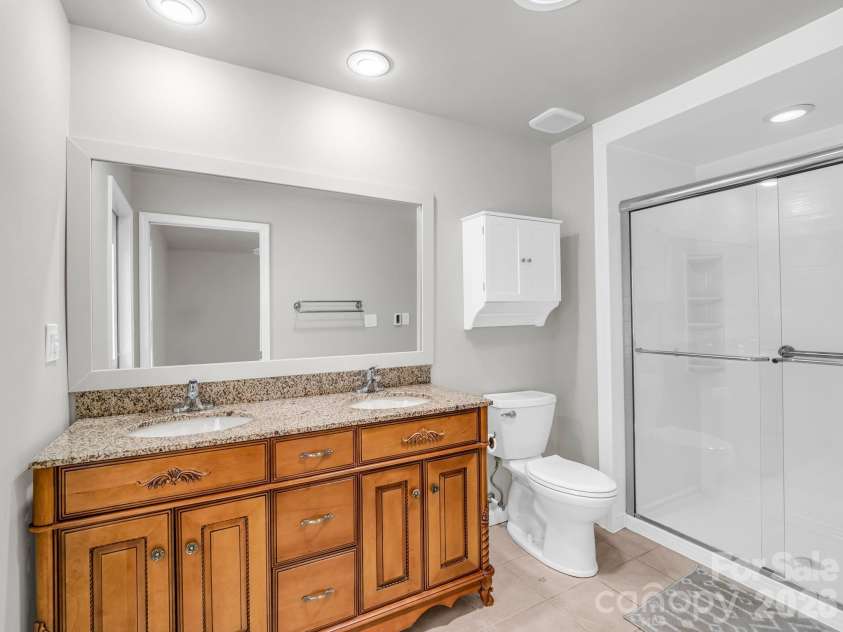 260 Warrior Drive, Tryon, NC 28782.  MLS# CAR4359501, YatesRealty ID 13291. Primary Bathroom