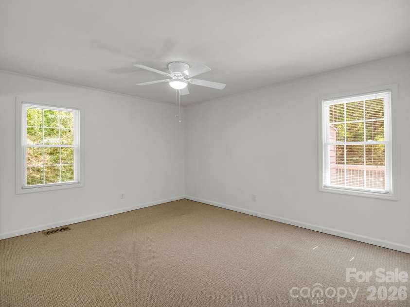 260 Warrior Drive, Tryon, NC 28782.  MLS# CAR4359501, YatesRealty ID 13291. Primary suite without virtual imaging