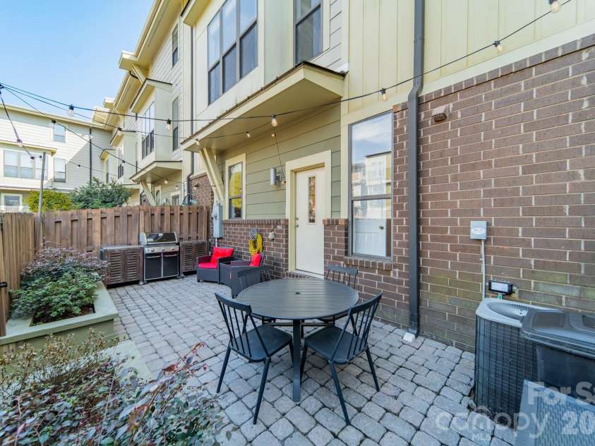 3409 Spencer Street, Charlotte, NC 28205.  MLS# CAR4357340, YatesRealty ID 13293. Back Patio Seating