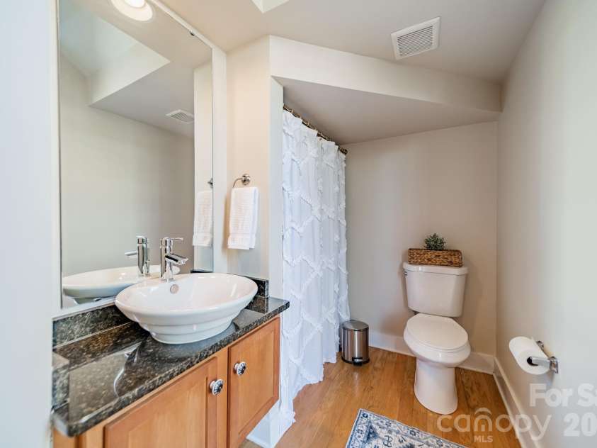 3409 Spencer Street, Charlotte, NC 28205.  MLS# CAR4357340, YatesRealty ID 13293. Main Level Half Bath