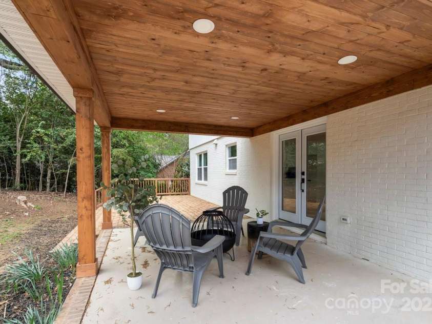 5910 Grosner Place, Charlotte, NC 28211.  MLS# CAR4257156, YatesRealty ID 13296. Beautiful backyard patio, new roof and gutters.