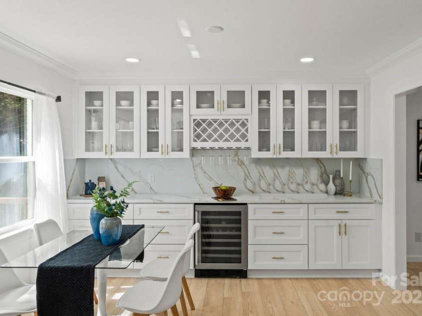 5910 Grosner Place, Charlotte, NC 28211.  MLS# CAR4257156, YatesRealty ID 13296. Custom built-ins with wine fridge.