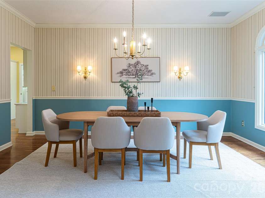 65 Timber Park Drive, Black Mountain, NC 28711.  MLS# CAR4344889, YatesRealty ID 13296. Large Formal Dining Room located off the kitchen 