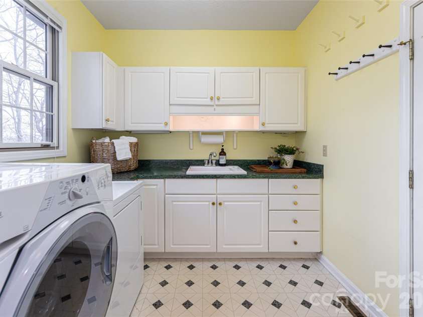 65 Timber Park Drive, Black Mountain, NC 28711.  MLS# CAR4344889, YatesRealty ID 13296. Laundry Room with sink 