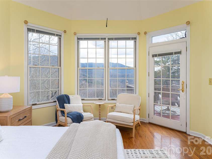 65 Timber Park Drive, Black Mountain, NC 28711.  MLS# CAR4344889, YatesRealty ID 13296. Primary Bedroom with mountain views 