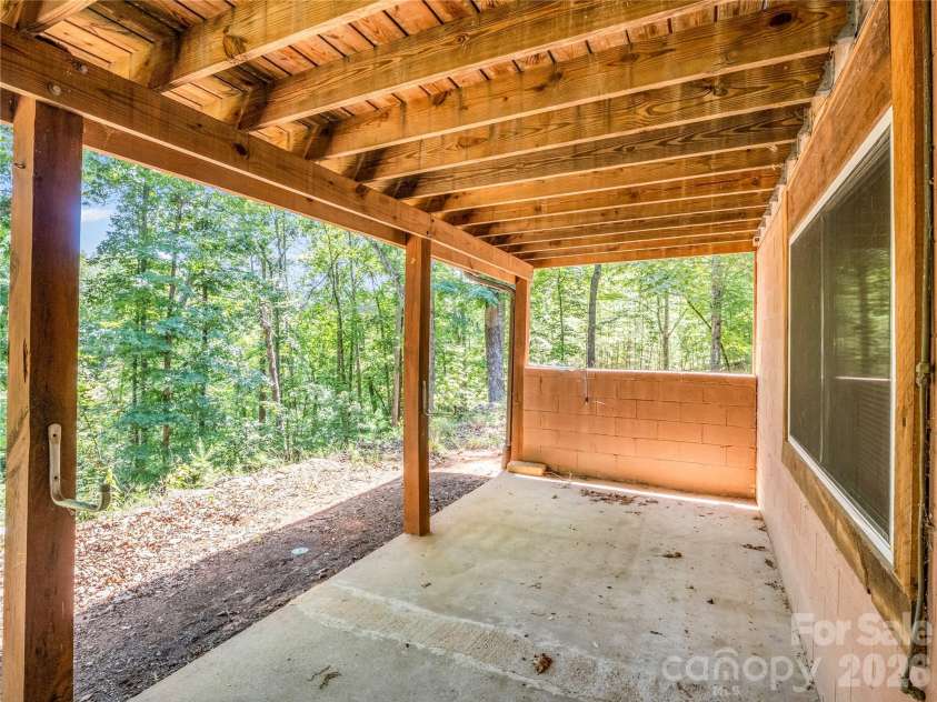 137 Amys Ridge Road, Lake Lure, NC 28746.  MLS# CAR4391704, YatesRealty ID 133. Lower Back Patio
