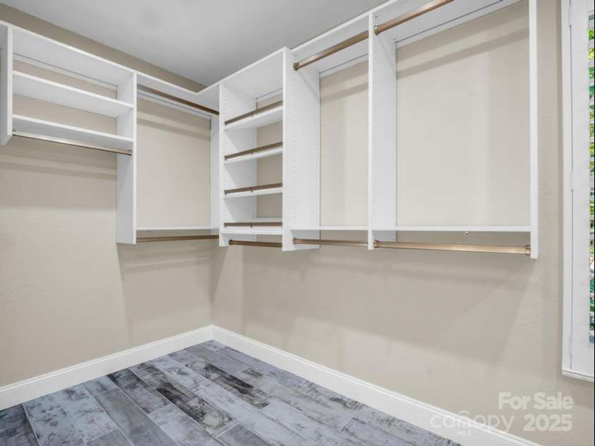 197 Hawthorne Drive, Lake Lure, NC 28746.  MLS# CAR4154813, YatesRealty ID 133. California Closet system adjoins the primary ensuite bathroom.