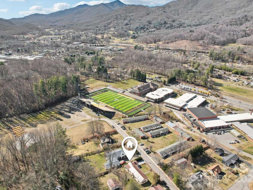 131 Ridgewood Drive, Waynesville, NC 28786.  MLS# CAR4222863, YatesRealty ID 1330. On Fall Friday nights, hear the band without buying a ticket!