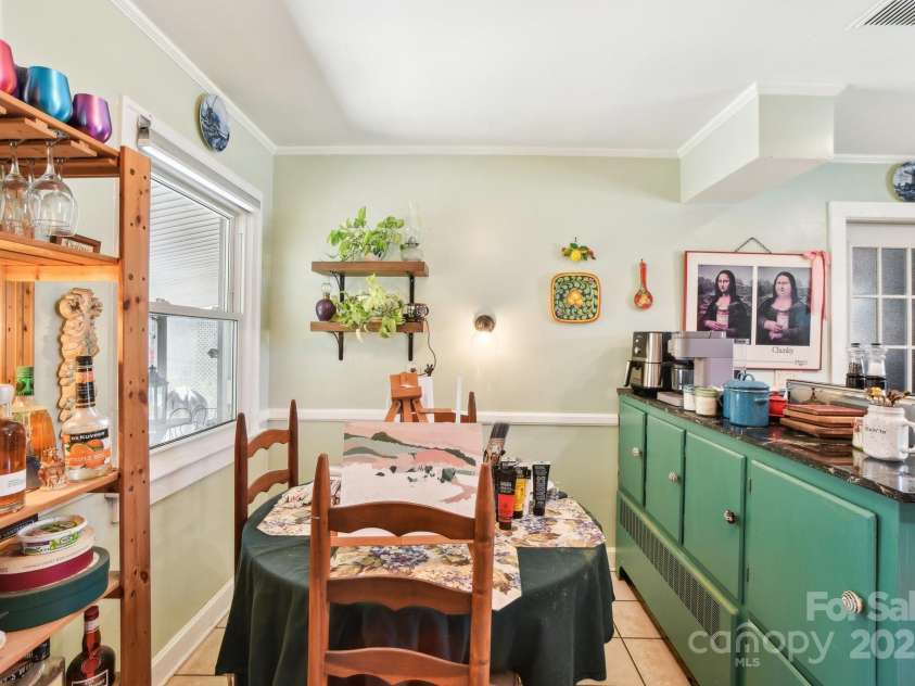 131 Ridgewood Drive, Waynesville, NC 28786.  MLS# CAR4222863, YatesRealty ID 1330. The current owner uses the nook for painting projects.