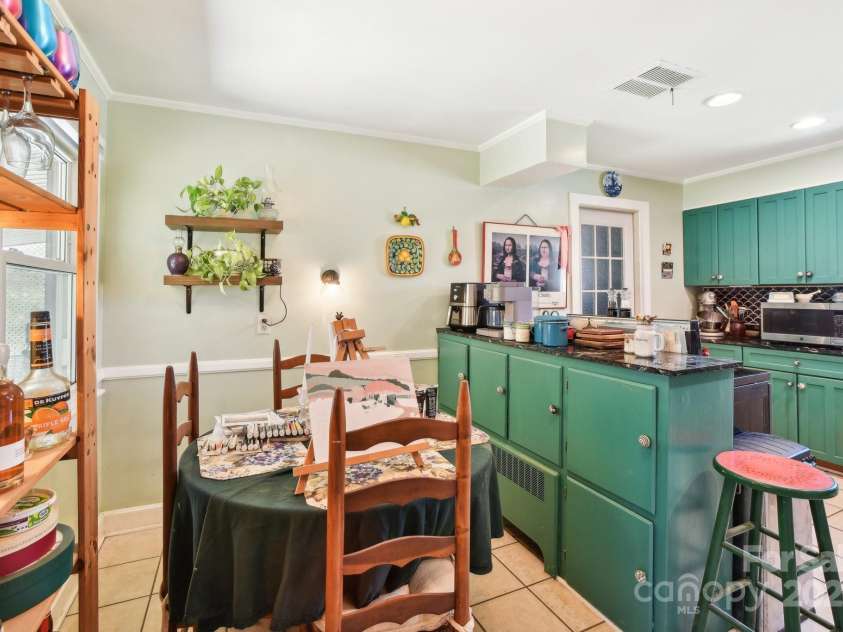 131 Ridgewood Drive, Waynesville, NC 28786.  MLS# CAR4222863, YatesRealty ID 1330. There, you're greeted by a nook area suitable for breakfast, hobbies, or homework.