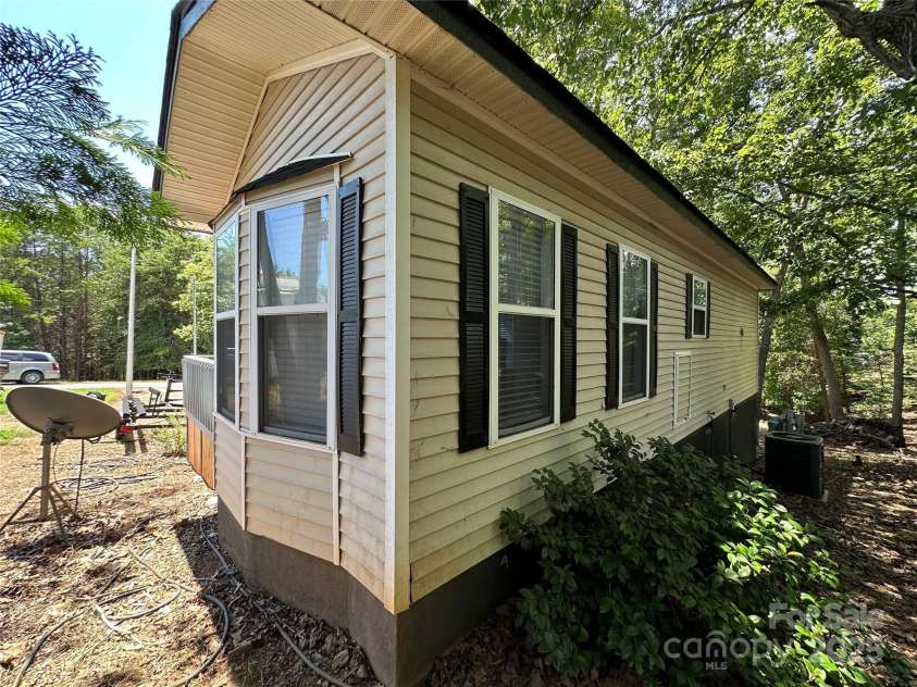 112 Cardinal Drive, New London, NC 28127.  MLS# CAR4286195, YatesRealty ID 13301. 