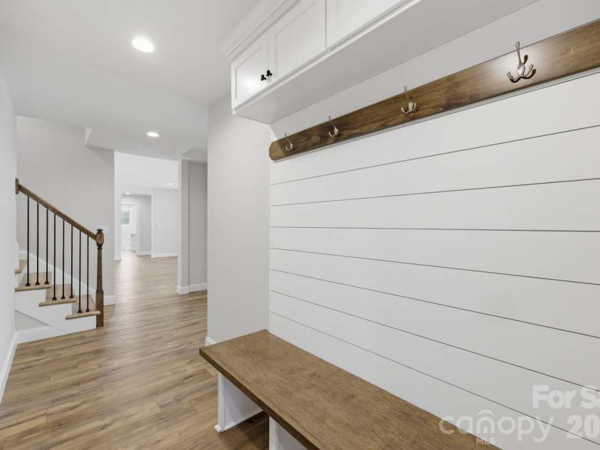 2587 Wallace Acres Lane, Lincolnton, NC 28092.  MLS# CAR4369112, YatesRealty ID 13302. A stylish white shiplap-accented drop zone  designed for organization & functionality 