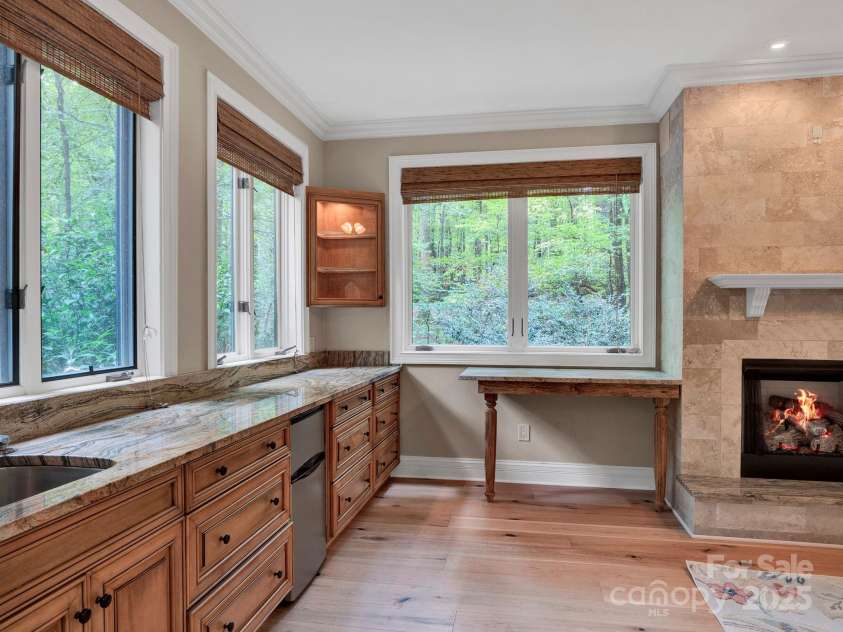 225 Riverton Road, Weddington, NC 28104.  MLS# CAR4306404, YatesRealty ID 13305. Gorgeous Breakfast bar and cabinetry.