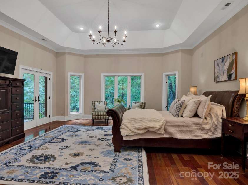 225 Riverton Road, Weddington, NC 28104.  MLS# CAR4306404, YatesRealty ID 13305. Large Primary Bedroom with access to the deck.