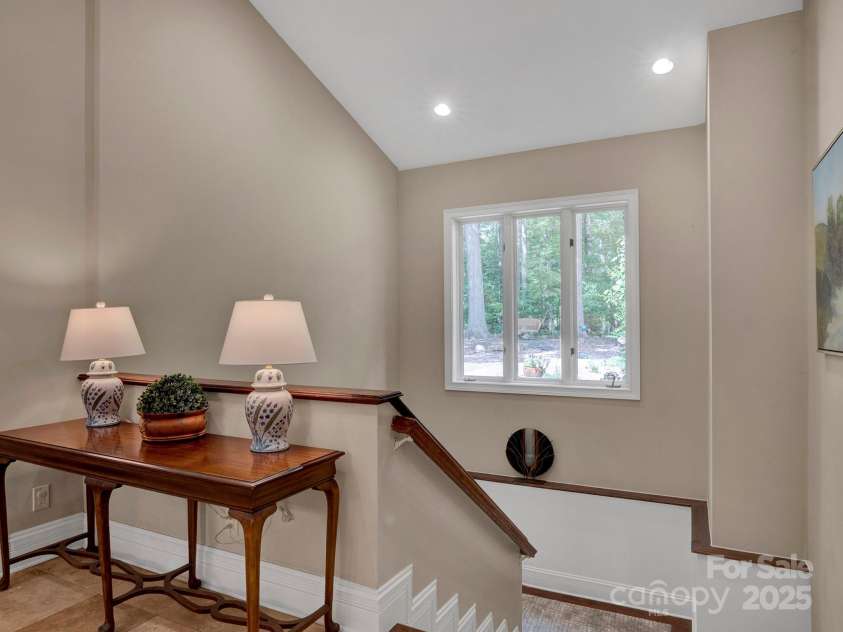 225 Riverton Road, Weddington, NC 28104.  MLS# CAR4306404, YatesRealty ID 13305. Large stairway to Lower level