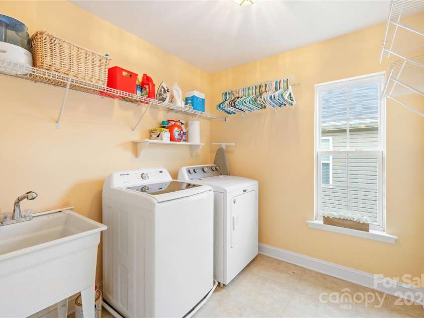 114 Silverspring Place, Mooresville, NC 28117.  MLS# CAR4187492, YatesRealty ID 1331. 2nd Floor Laundry Room