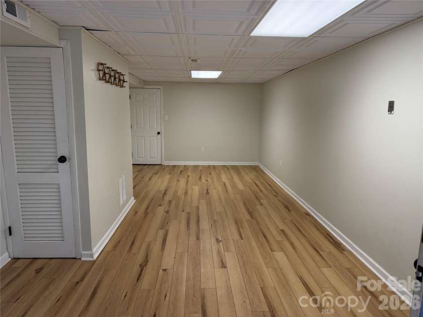 196 Weston Road, Arden, NC 28704.  MLS# CAR4327899, YatesRealty ID 13313. Finished basement