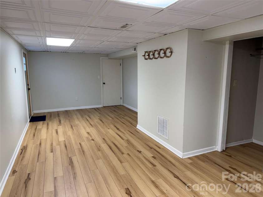 196 Weston Road, Arden, NC 28704.  MLS# CAR4327899, YatesRealty ID 13313. Finished basement area