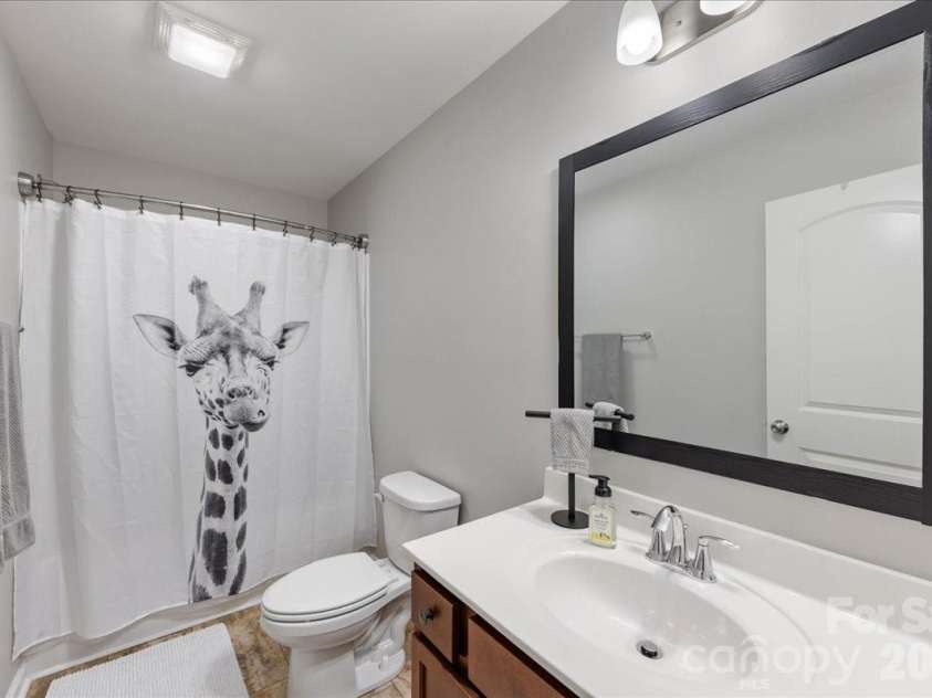 154 Sutters Mill Drive, Troutman, NC 28166.  MLS# CAR4356786, YatesRealty ID 13314. Guest bathroom.