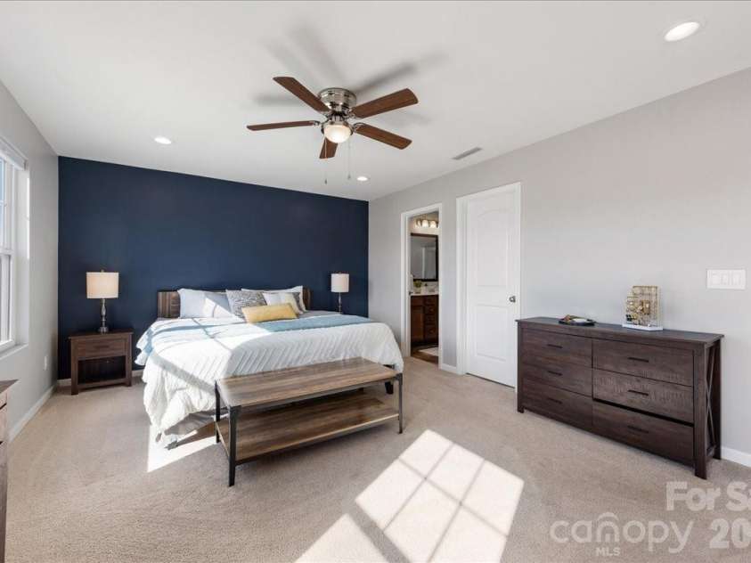 154 Sutters Mill Drive, Troutman, NC 28166.  MLS# CAR4356786, YatesRealty ID 13314. Primary suite includes a large walk-in closet!