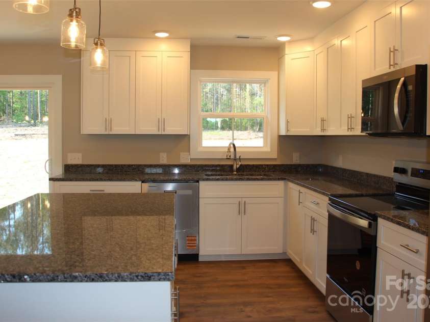 4304 Fletcher Funderburk Road, Lancaster, SC 29720.  MLS# CAR4251478, YatesRealty ID 13318. Beautiful cabinets in kitchen