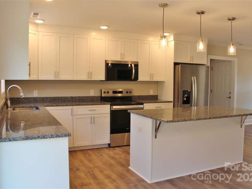 4304 Fletcher Funderburk Road, Lancaster, SC 29720.  MLS# CAR4251478, YatesRealty ID 13318. Kitchen with island