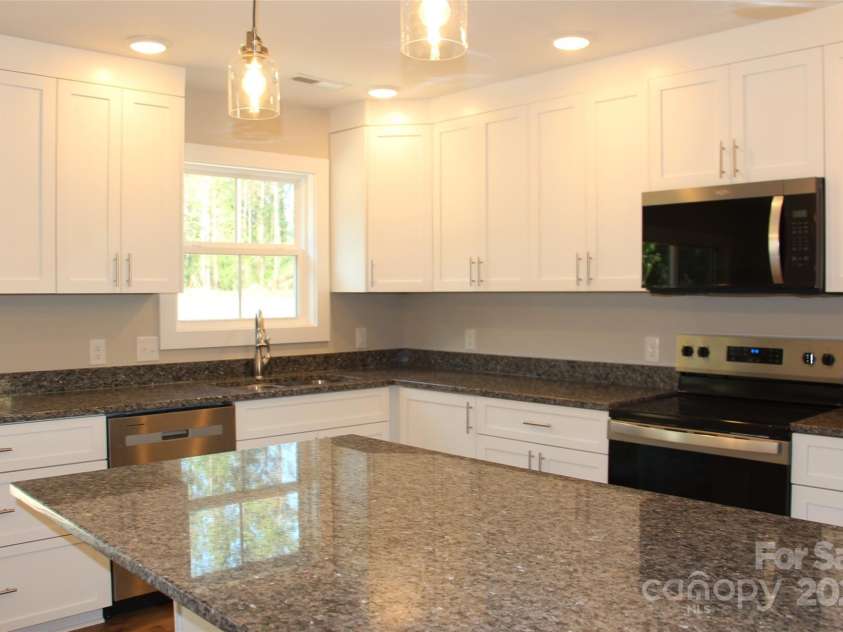 4304 Fletcher Funderburk Road, Lancaster, SC 29720.  MLS# CAR4251478, YatesRealty ID 13318. Lots of counter space with granite tops