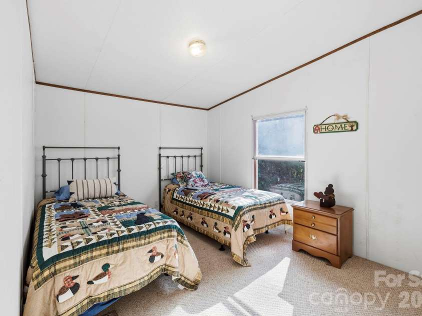 76 Gobblers Knob Road, Penrose, NC 28766.  MLS# CAR4337072, YatesRealty ID 13318. 