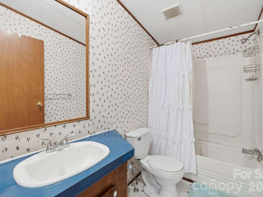76 Gobblers Knob Road, Penrose, NC 28766.  MLS# CAR4337072, YatesRealty ID 13318. 