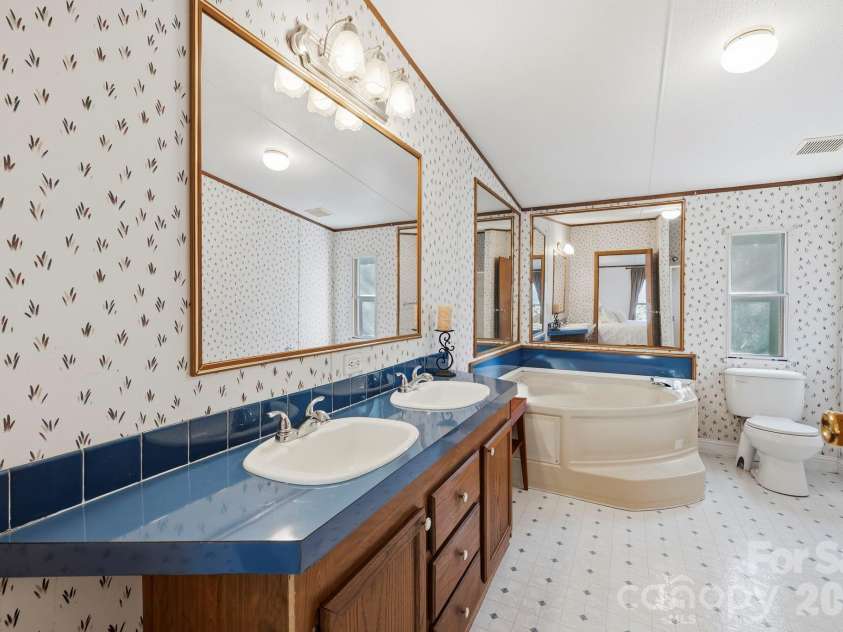 76 Gobblers Knob Road, Penrose, NC 28766.  MLS# CAR4337072, YatesRealty ID 13318. 