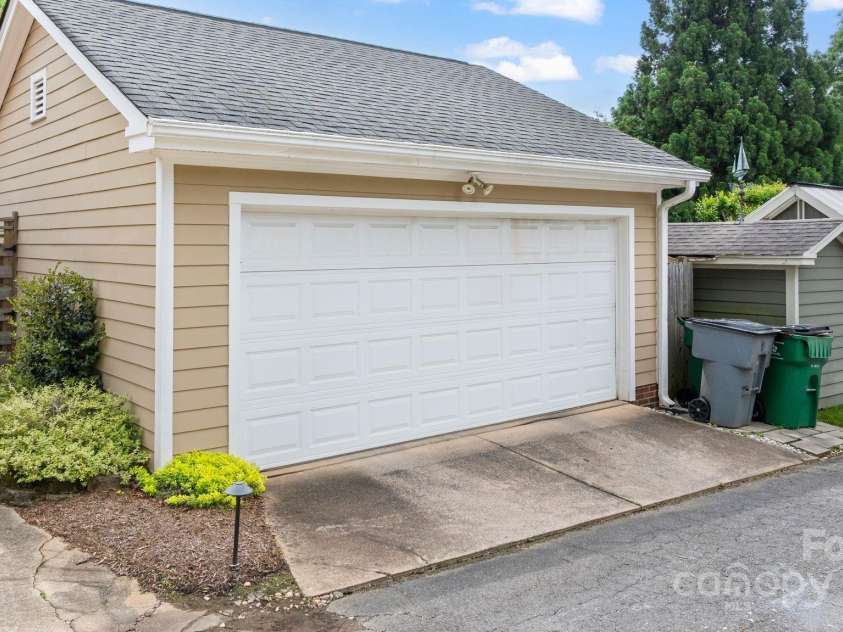 2306 Club Road, Charlotte, NC 28205.  MLS# CAR4250030, YatesRealty ID 13319. 2-car garage with private alley access and extra parking pad