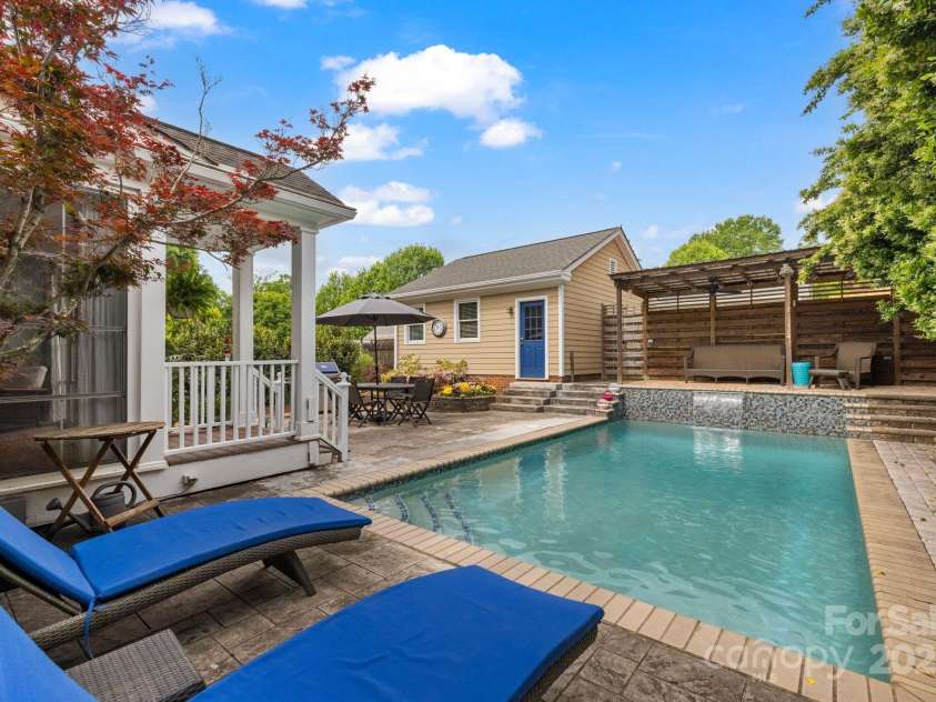 2306 Club Road, Charlotte, NC 28205.  MLS# CAR4250030, YatesRealty ID 13319. Relax by the pool or dine under the open Carolina sky