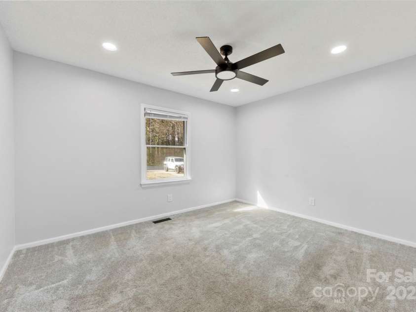 5034 Clearwater Lake Road, Mount Holly, NC 28120.  MLS# CAR4203029, YatesRealty ID 13328. Bedroom 2