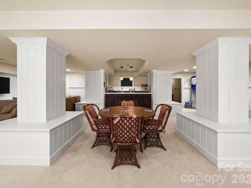 7024 Riesman Lane, Charlotte, NC 28210.  MLS# CAR4355789, YatesRealty ID 13329. Lower-level entertainment area. 