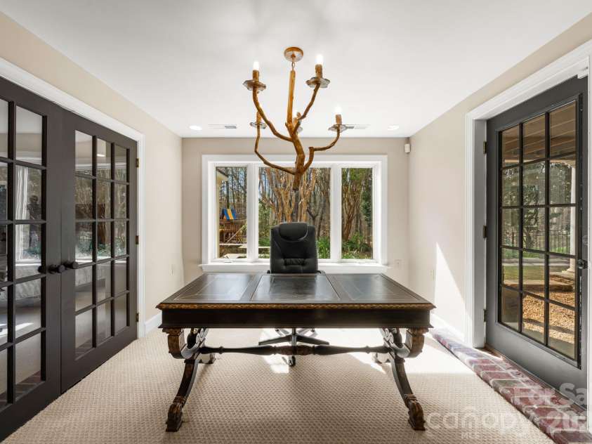 7024 Riesman Lane, Charlotte, NC 28210.  MLS# CAR4355789, YatesRealty ID 13329. Lower-level office area. 