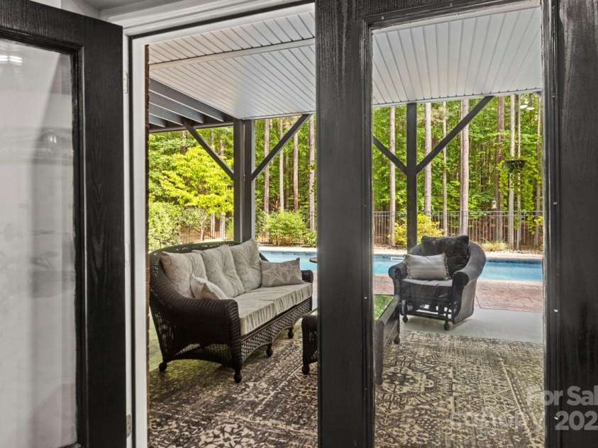 1956 Forest Ridge Drive, Stanley, NC 28164.  MLS# CAR4253801, YatesRealty ID 13330. Head out to the pool from the basement